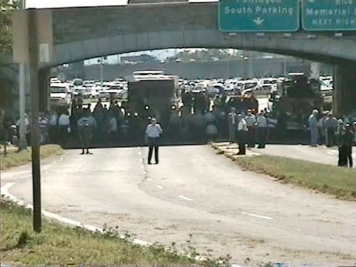 People under bridge near South Parking